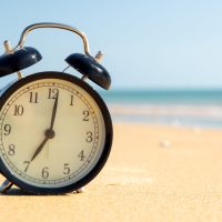 Alarm clock on the beach